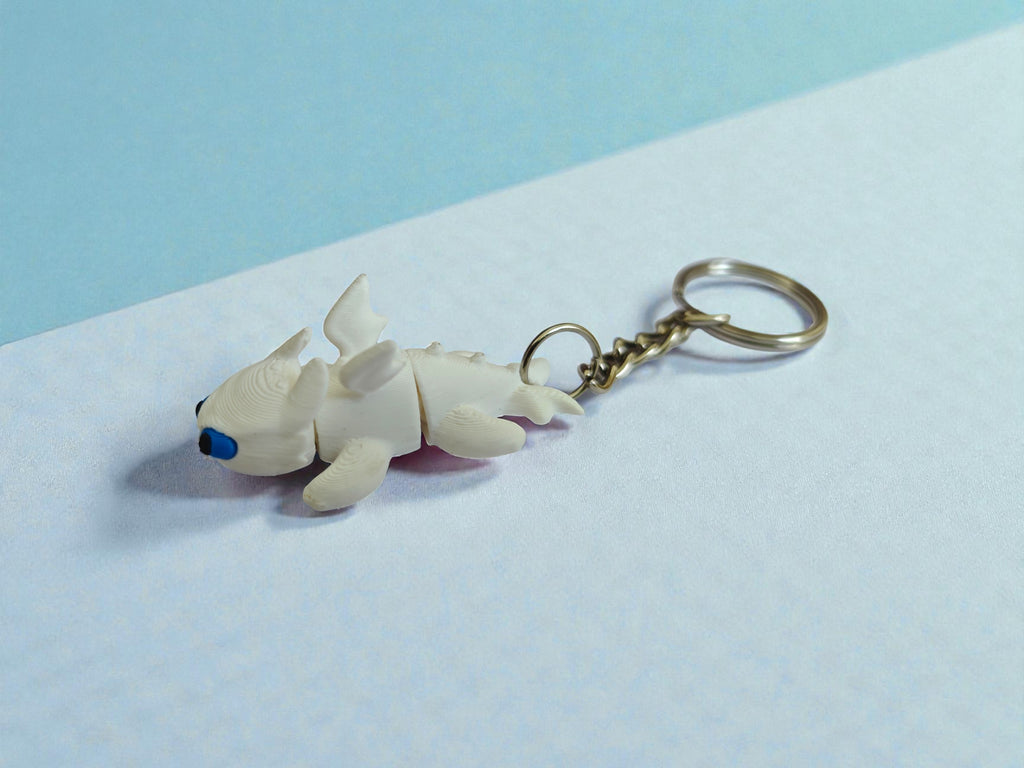 3D Printed flexi white toothless dragon keychain